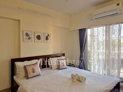 Bedroom 1 of TrustedStay Dsilva Niketan Service Apartment in Kurla West, Mumbai
